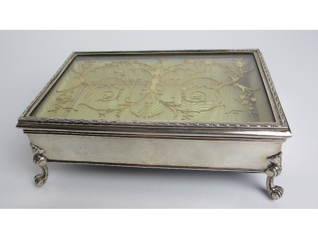 Appraisal: A silver and glass topped jewellery box with gilt foliate