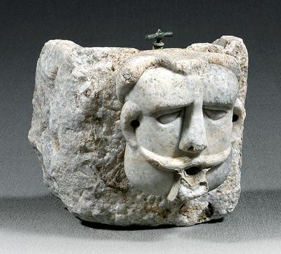 Appraisal: Carved marble fountainhead man with mustache and open mouth spigot