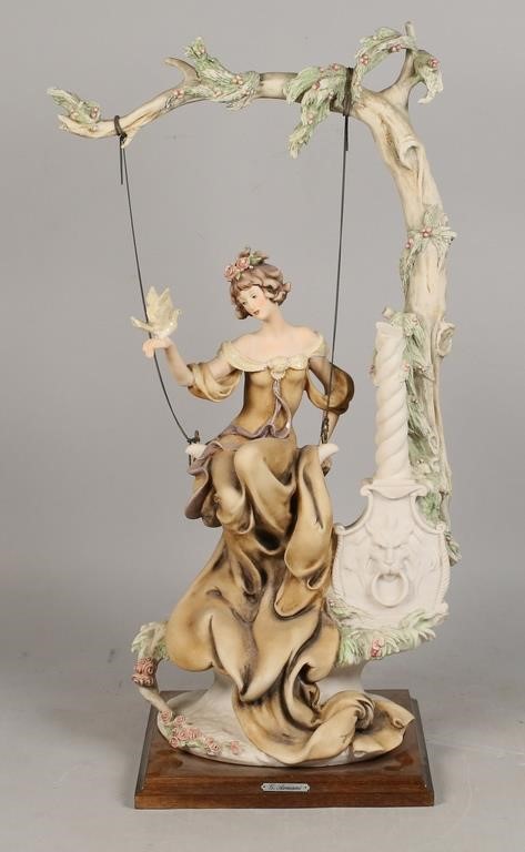 Appraisal: Guiseppe Armani Capodimonte porcelain statue Woman on a swing Mounted