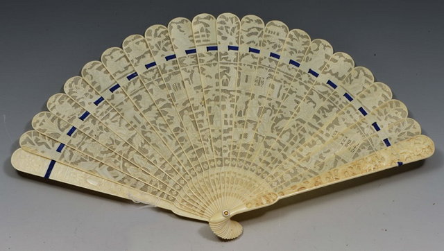 Appraisal: A CHINESE CARVED IVORY CANTON FAN the guards carved with