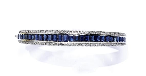 Appraisal: A SAPPHIRE AND DIAMOND BANGLE circa White gold Elegant bangle