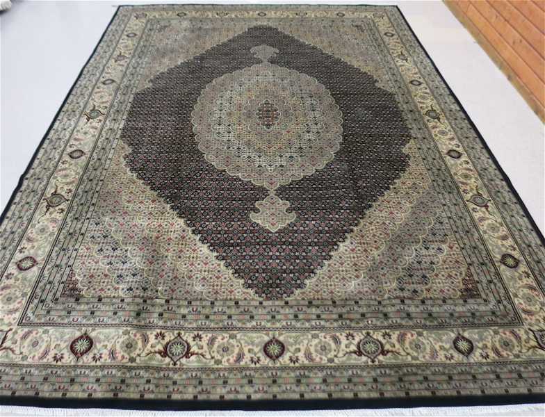 Appraisal: LARGE HAND KNOTTED ORIENTAL CARPET Persian Bijar design overall Heratif