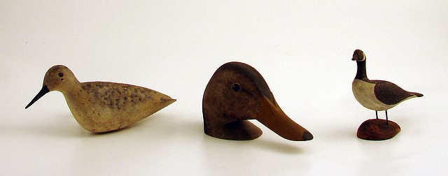 Appraisal: Grouping of three carvings by Chris Sprague Full size black