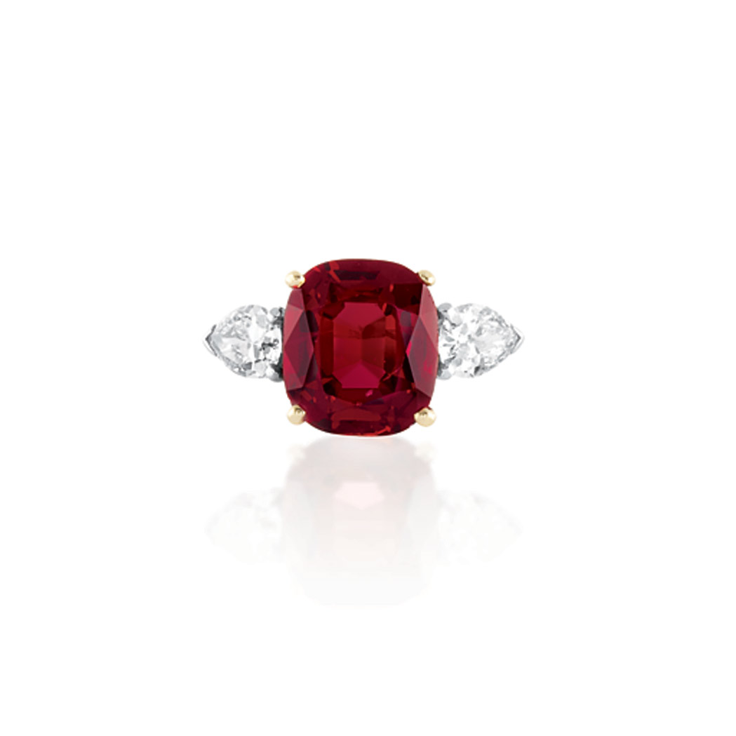 Appraisal: Platinum Gold Ruby and Diamond Ring Centering one cushion-shaped ruby