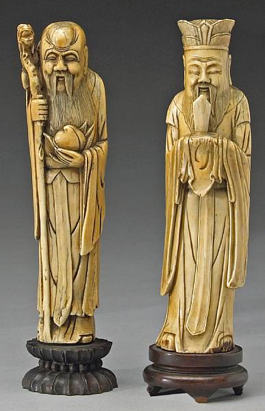 Appraisal: Two carved ivory figures The first th th Century depicting