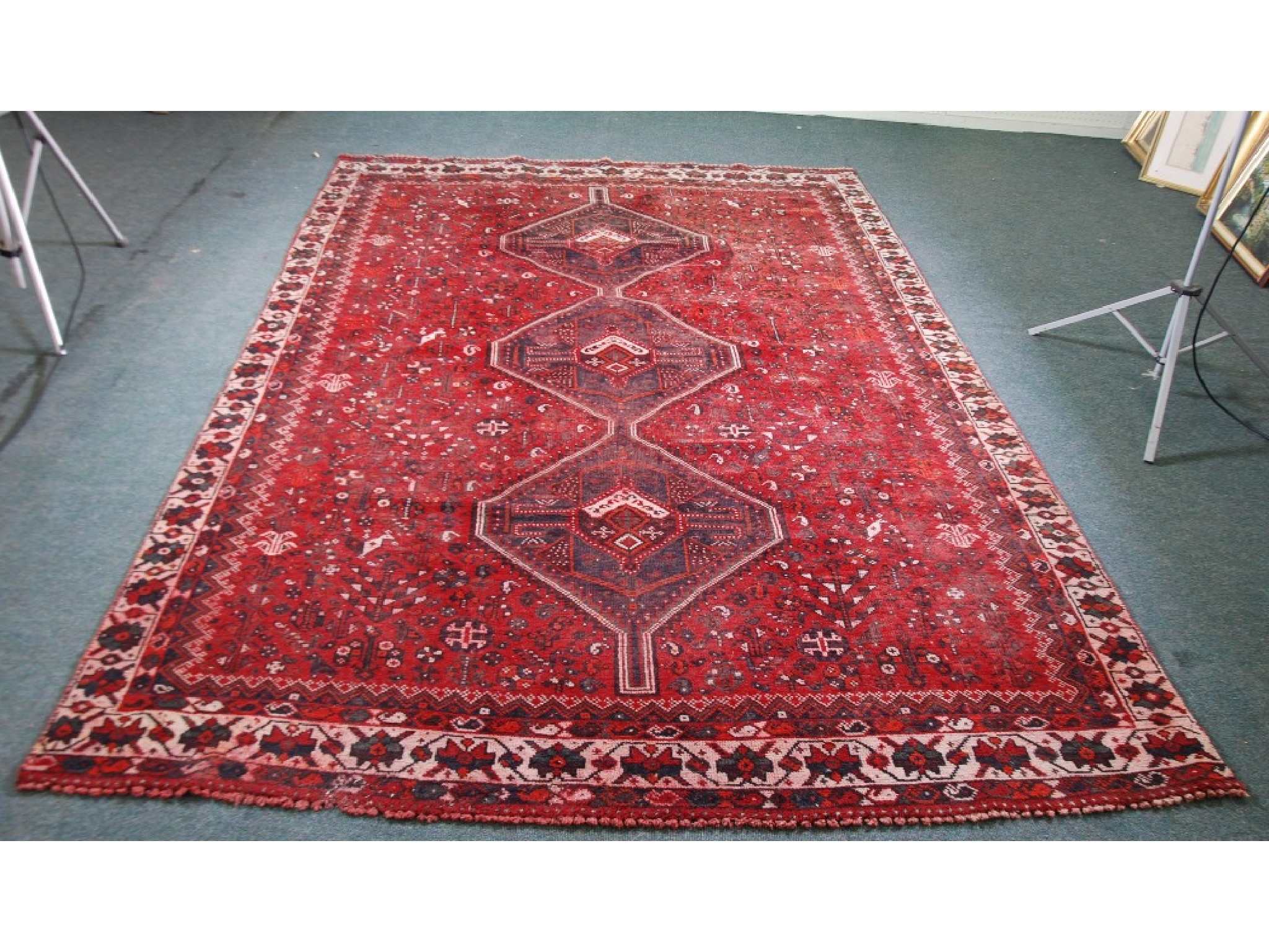 Appraisal: CAUCASIAN CARPET With triple pole medallion in midnight blue on