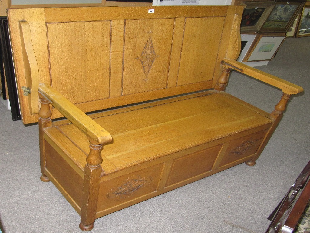 Appraisal: Carved oak hall settle