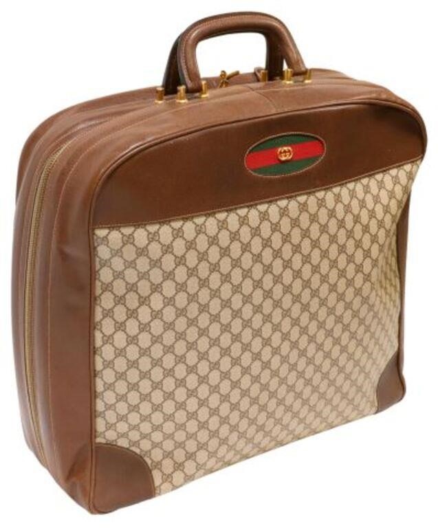 Appraisal: Gucci garment bag suitcase in brown leather and monogram canvas