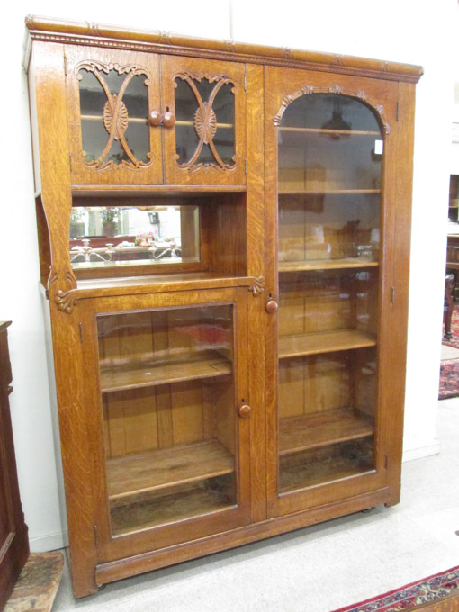 Appraisal: LARGE OAK CHINA CABINET American last quarter of the th