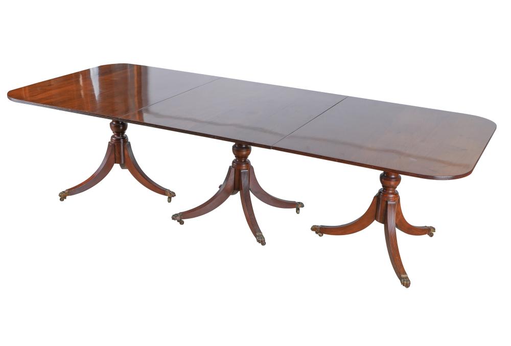 Appraisal: GEORGIAN-STYLE MAHOGANY DINING TABLEthe rectangular top with rounded corners raised