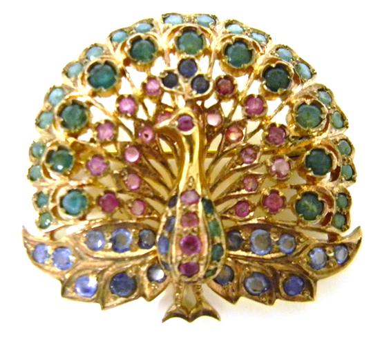 Appraisal: Multi-colored gemstone peacock brooch tested K yellow gold contains round