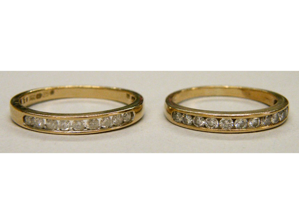 Appraisal: Two similar ct diamond channel set rings