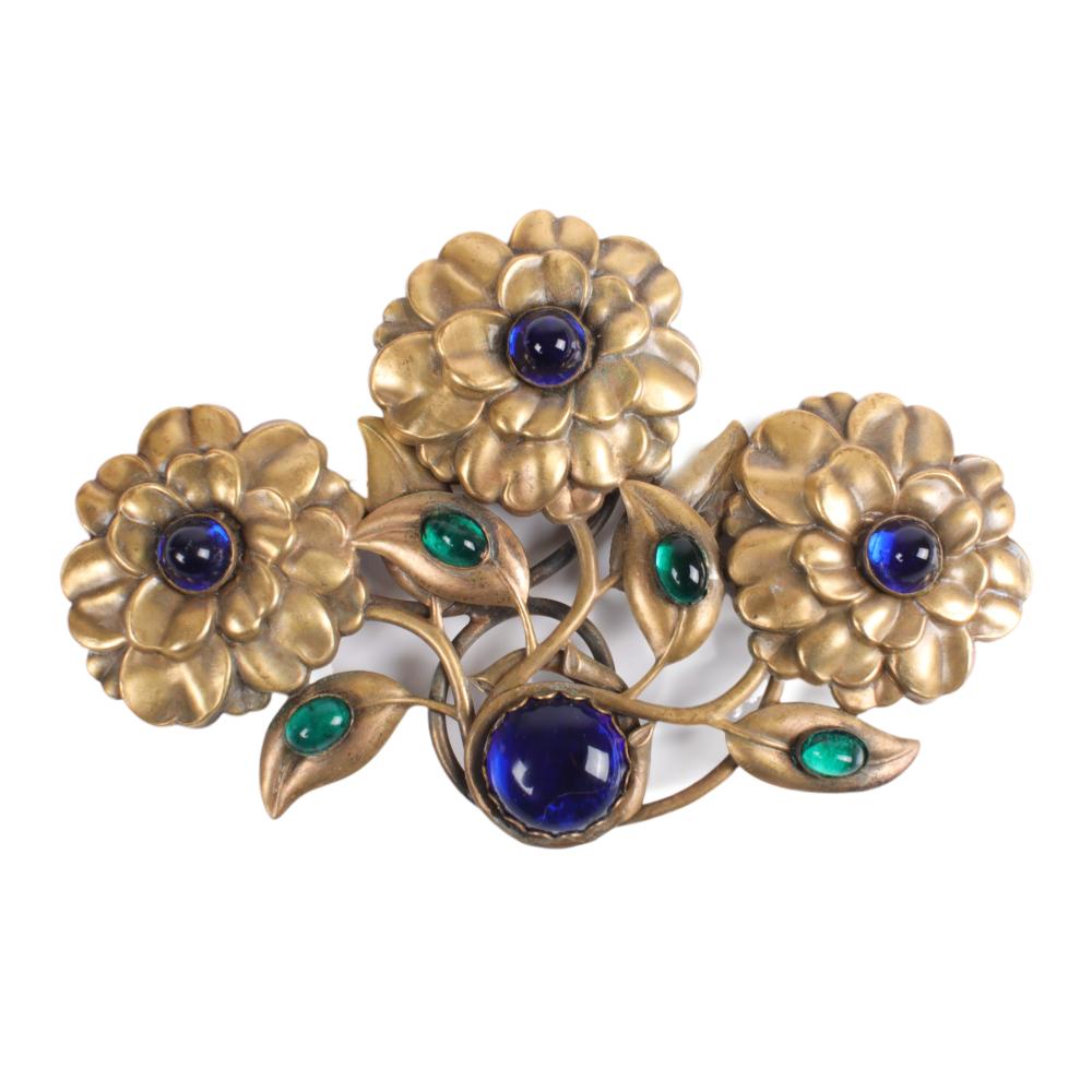 Appraisal: JOSEFF OF HOLLYWOOD BRASS REPOUSSE FLORAL BROOCH BEJEWELED WITH BLUE