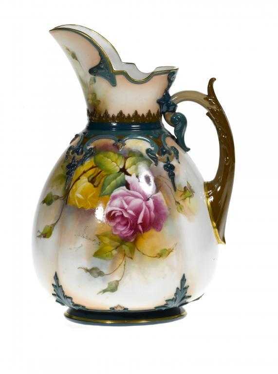 Appraisal: A ROYAL WORCESTER EWER of lobed sack shape with tusk