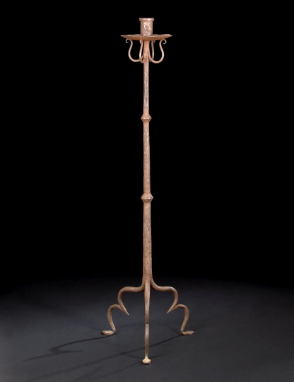 Appraisal: Spanish Provincial Wrought-Iron Floor Candlestick th century the single candleholder