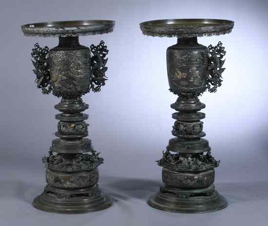 Appraisal: PAIR JAPANESE MIXED METAL VASES Meiji Period Cast with figural