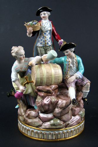 Appraisal: MEISSEN PORCELAIN FIGURAL GROUP c Man standing holding grapes in