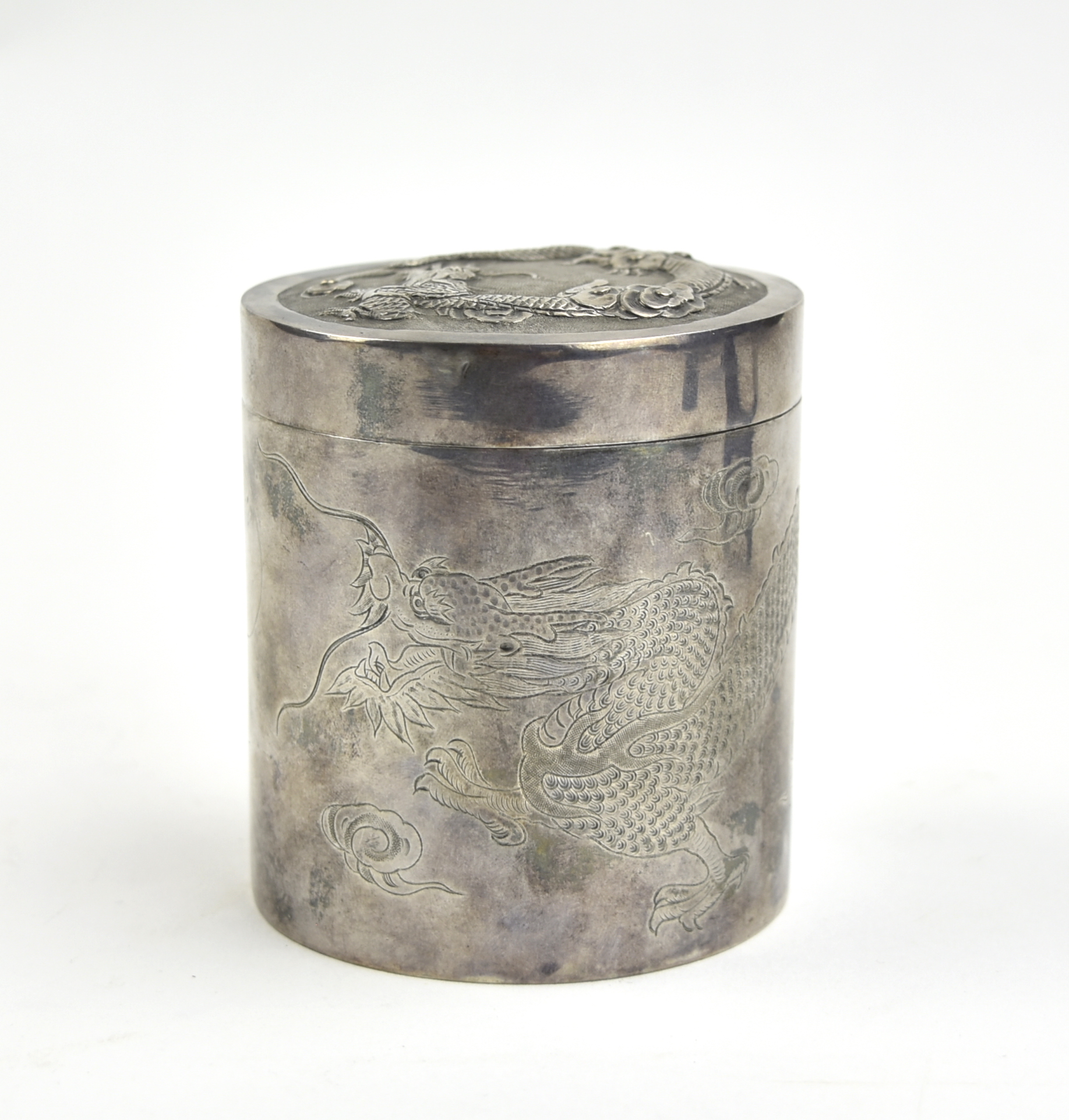 Appraisal: export silver circular box body carved with ferocious four clawed