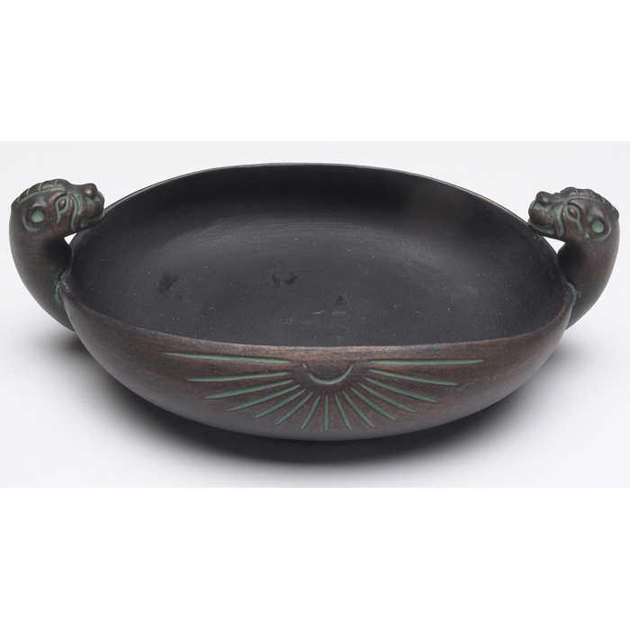 Appraisal: Norse bowl low shape with two figural handles in a