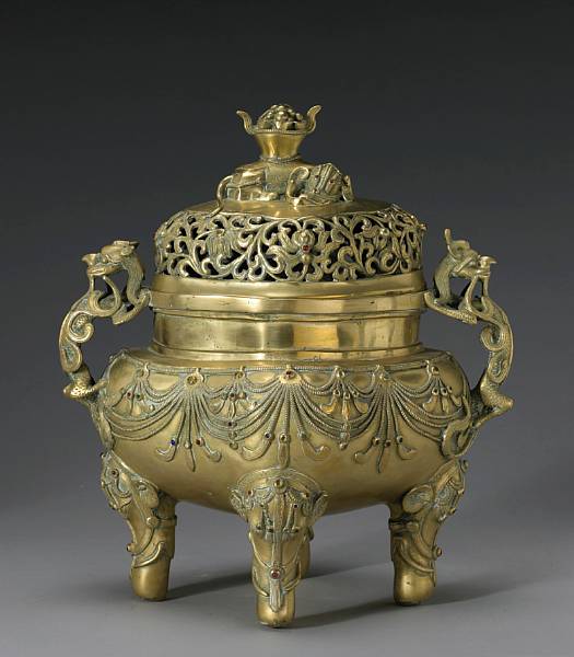 Appraisal: A brass covered censer with elephant and dragon decoration The