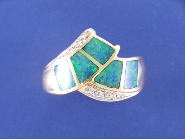 Appraisal: A ct gold opal and six diamond set dress ring