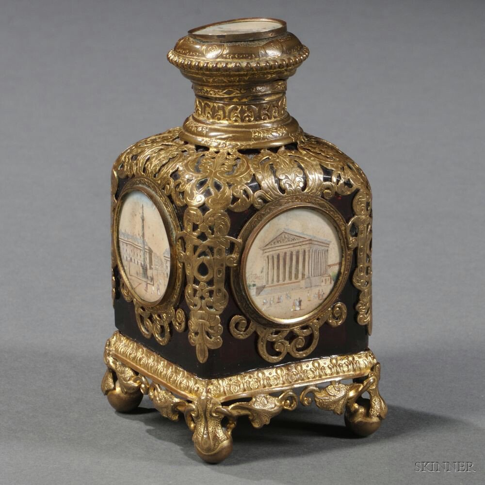 Appraisal: Gilt-brass and Miniature-mounted Perfume Bottle France th century square ruby