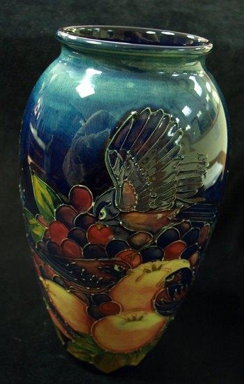 Appraisal: A Moorcroft vase Blue Finches pattern of baluster form the