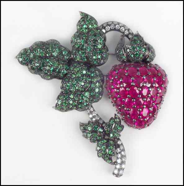 Appraisal: RUBY TSAVORITE DIAMOND AND KARAT WHITE GOLD STRAWBERRY CLIP BROOCH