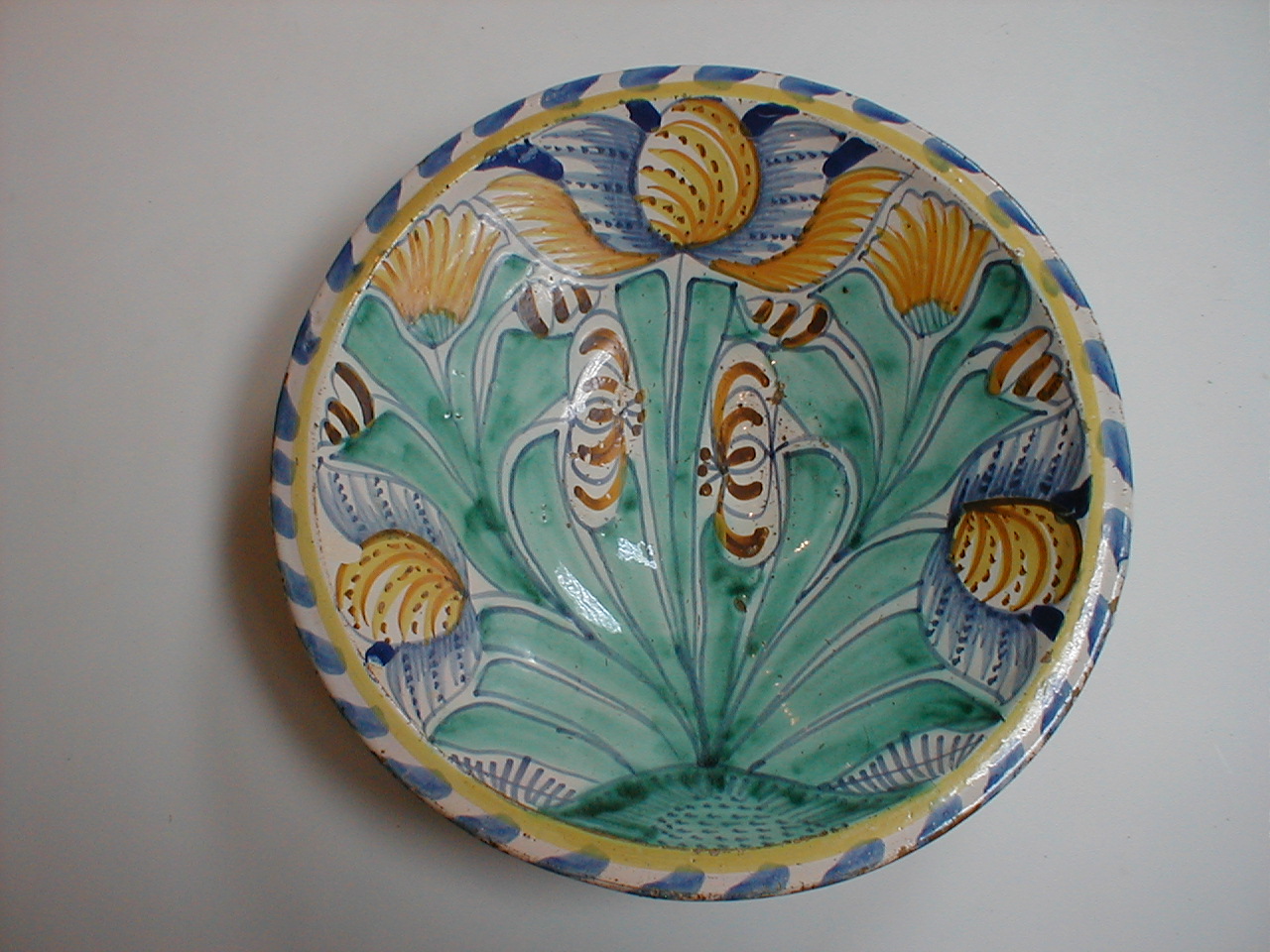 Appraisal: An exceptional thC London Delft polychrome tulip bowl the tin-glazed