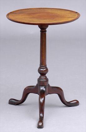 Appraisal: PENNSYLVANIA CHIPPENDALE MAHOGANY TRIPOD CANDLESTAND The circular fixed dished top