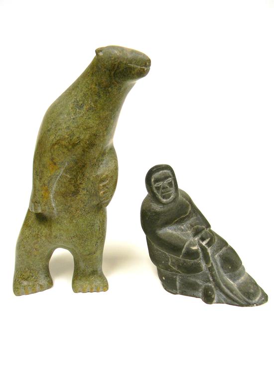 Appraisal: Two Canada Eskimo Inuit carved hardstone figures one a standing