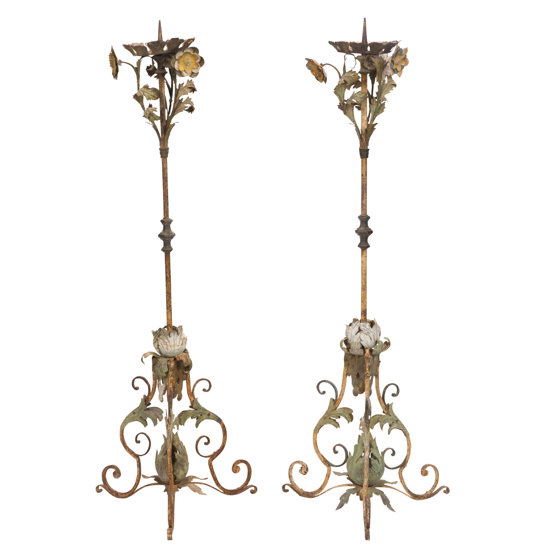 Appraisal: A PAIR OF CONTINENTAL BAROQUE STYLE IRON AND TOLE TORCHIERES