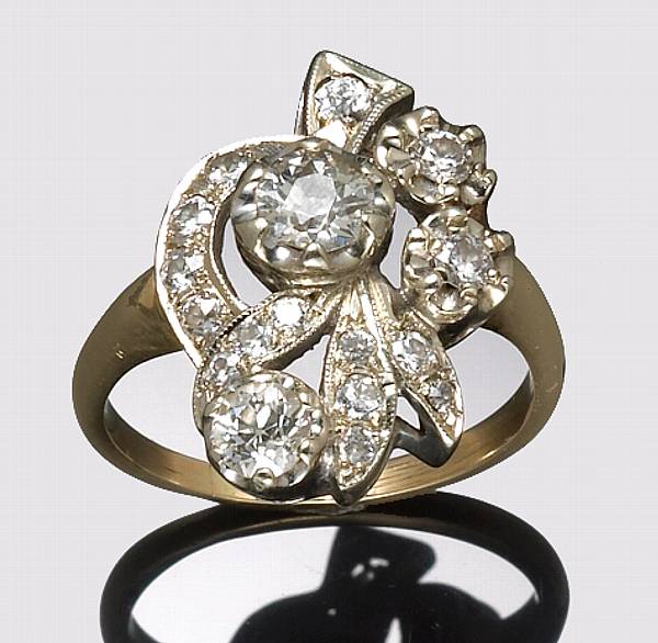 Appraisal: A diamond and k bicolor gold ring estimated total diamond