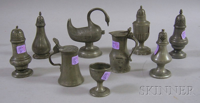 Appraisal: Nine Pieces of Pewter Hollowware five casters two small lidded