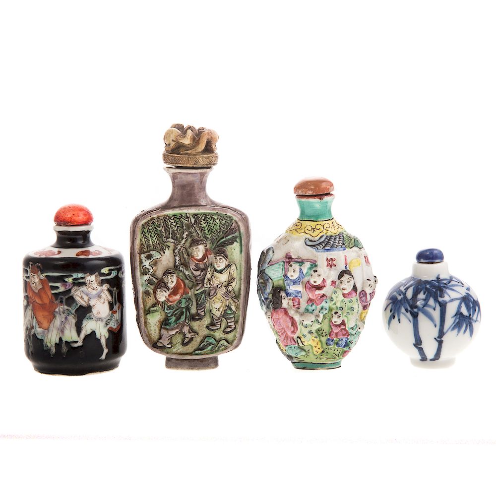 Appraisal: Four Chinese Porcelain Snuff Bottles including Famille Verte figural relief