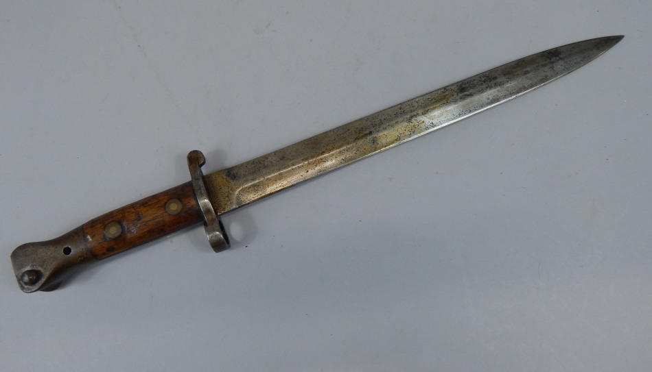 Appraisal: An early thC bayonet the blade stamped Anderson Sheffield with