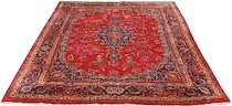 Appraisal: A Sarouk Carpet An ink blue oblong medallion flanked with