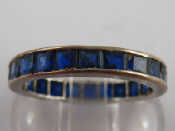 Appraisal: A white metal tests platinum sapphire eternity ring size N