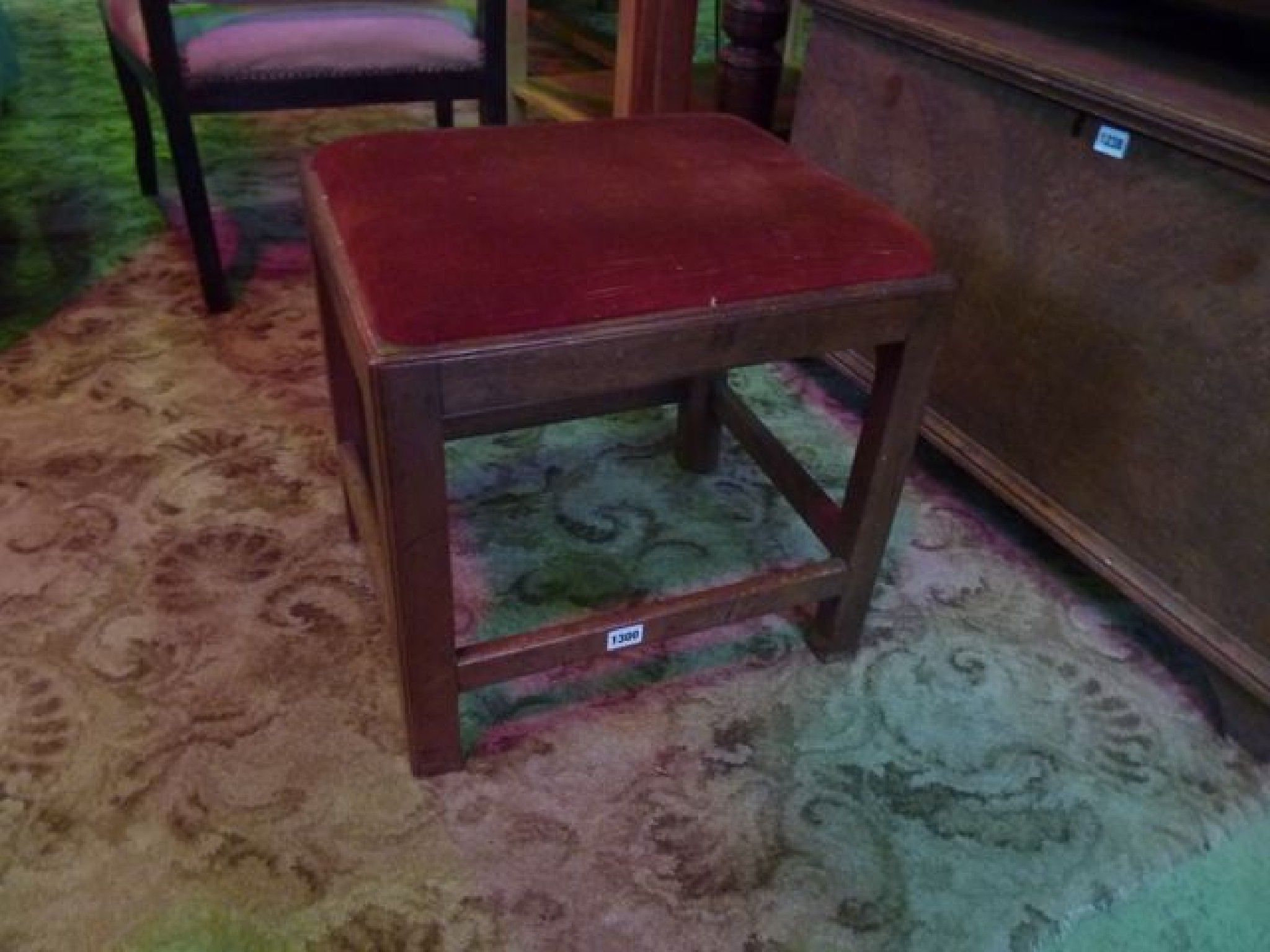 Appraisal: A Georgian mahogany stool of rectangular form with drop in