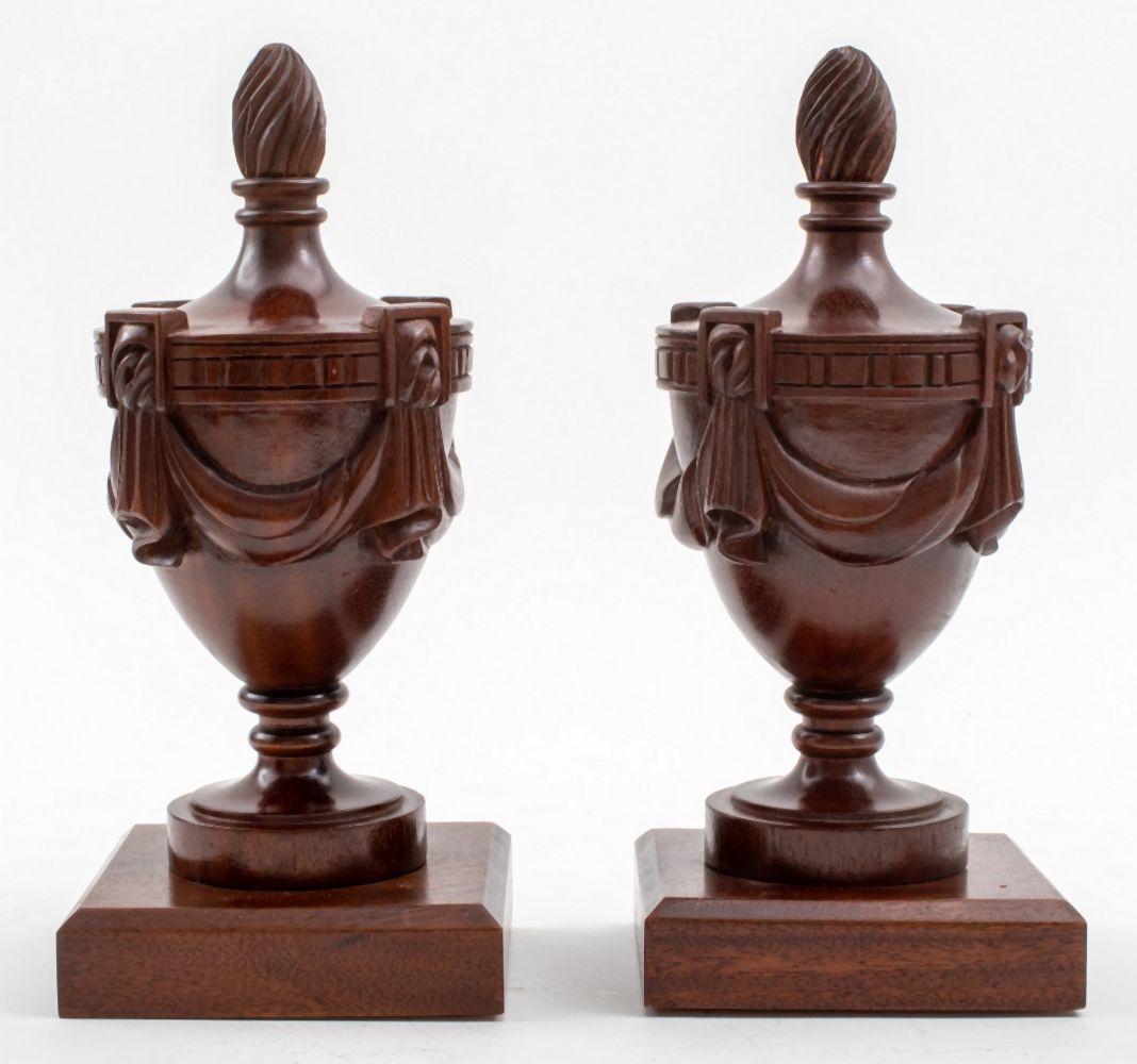 Appraisal: NEOCLASSICAL STYLE CARVED WOOD URNS PAIR Pair of wooden Neoclassical