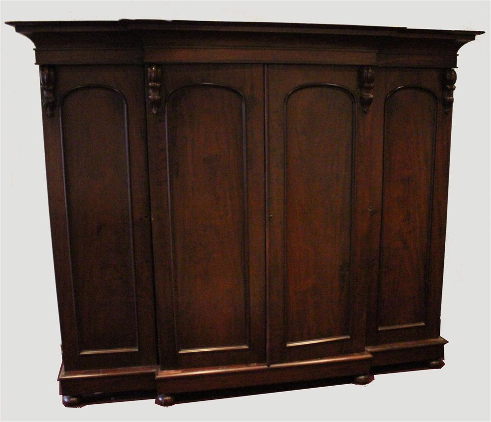 Appraisal: VICTORIAN TRIPLE BREAKFRONT MAHOGANY WARDROBE having a molded cornice with