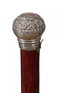 Appraisal: Fan System Cane- Ca - An ornate silver handle which