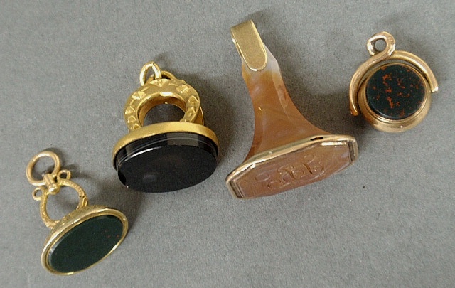 Appraisal: - Four watch fobs- k gold w bloodstone agate bloodstone