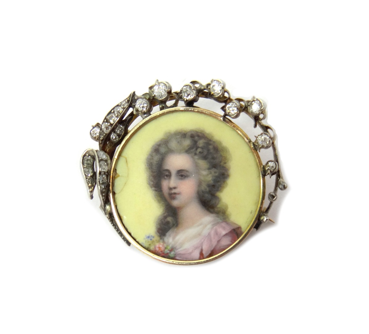 Appraisal: A gold mounted and silver set diamond and enamelled brooch