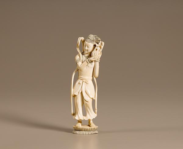 Appraisal: JAPANESE IVORY FIGURINE OF MAN WITH PAGODA Japanese Meiji period-ca