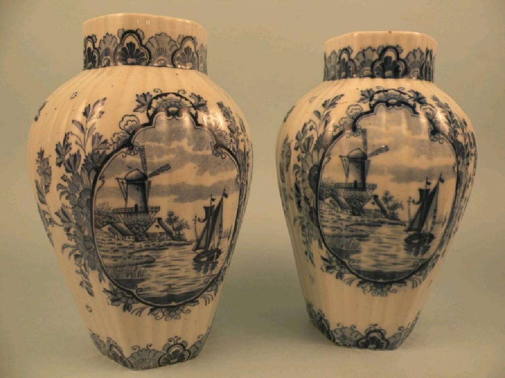 Appraisal: A pair of early thC Delft hexagonal vases each printed