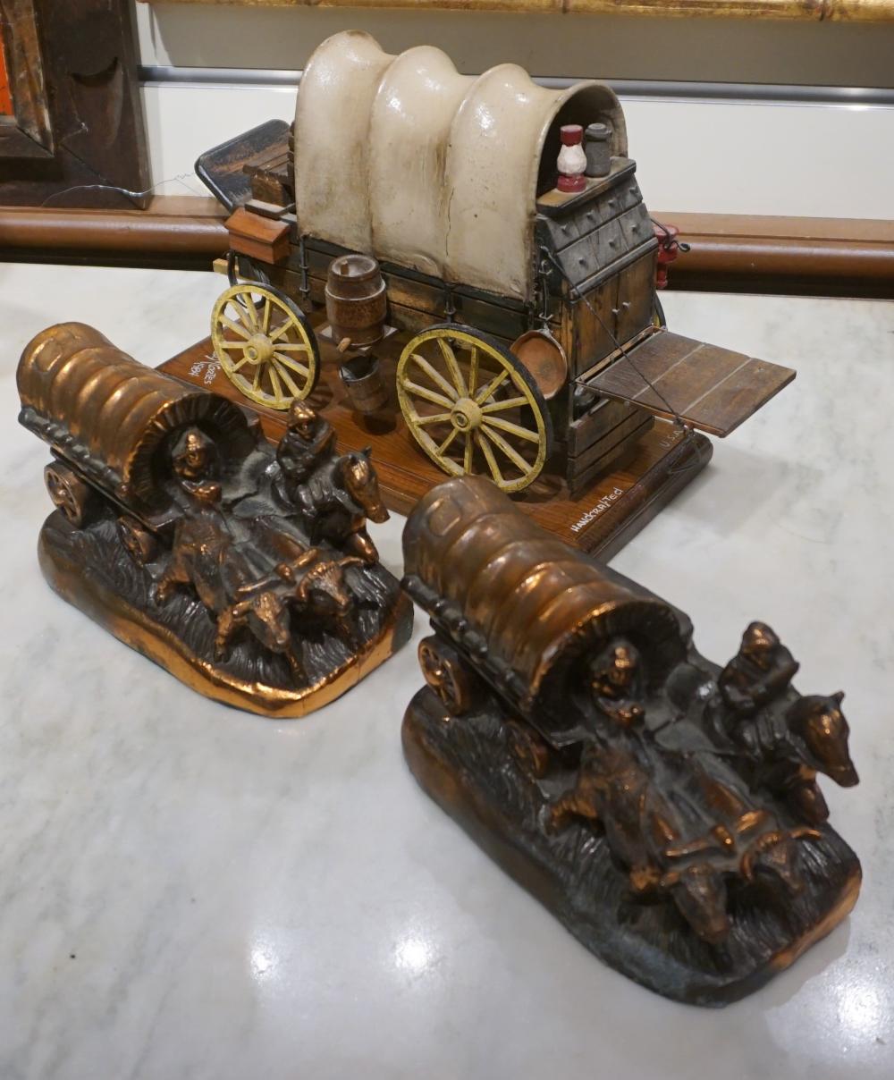 Appraisal: PAIR BRONZE COVERED WAGON BOOKENDS AND PAINTED WOOD MINIATURE COVERED