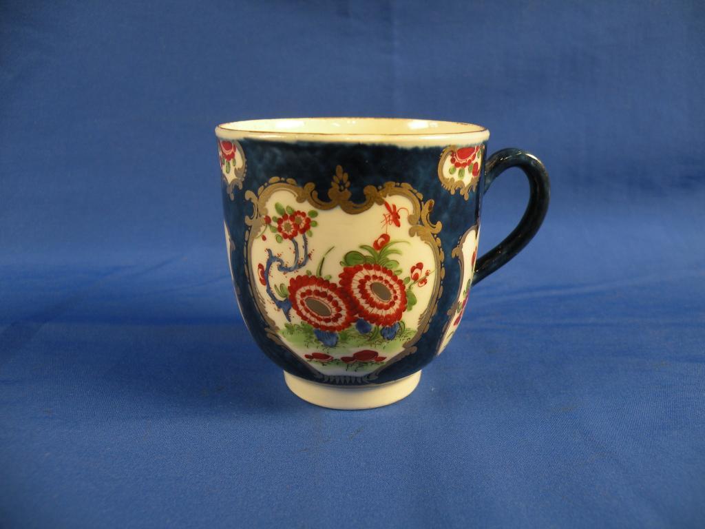 Appraisal: An thC Worcester coffee cup polychrome painted with gilt mirror