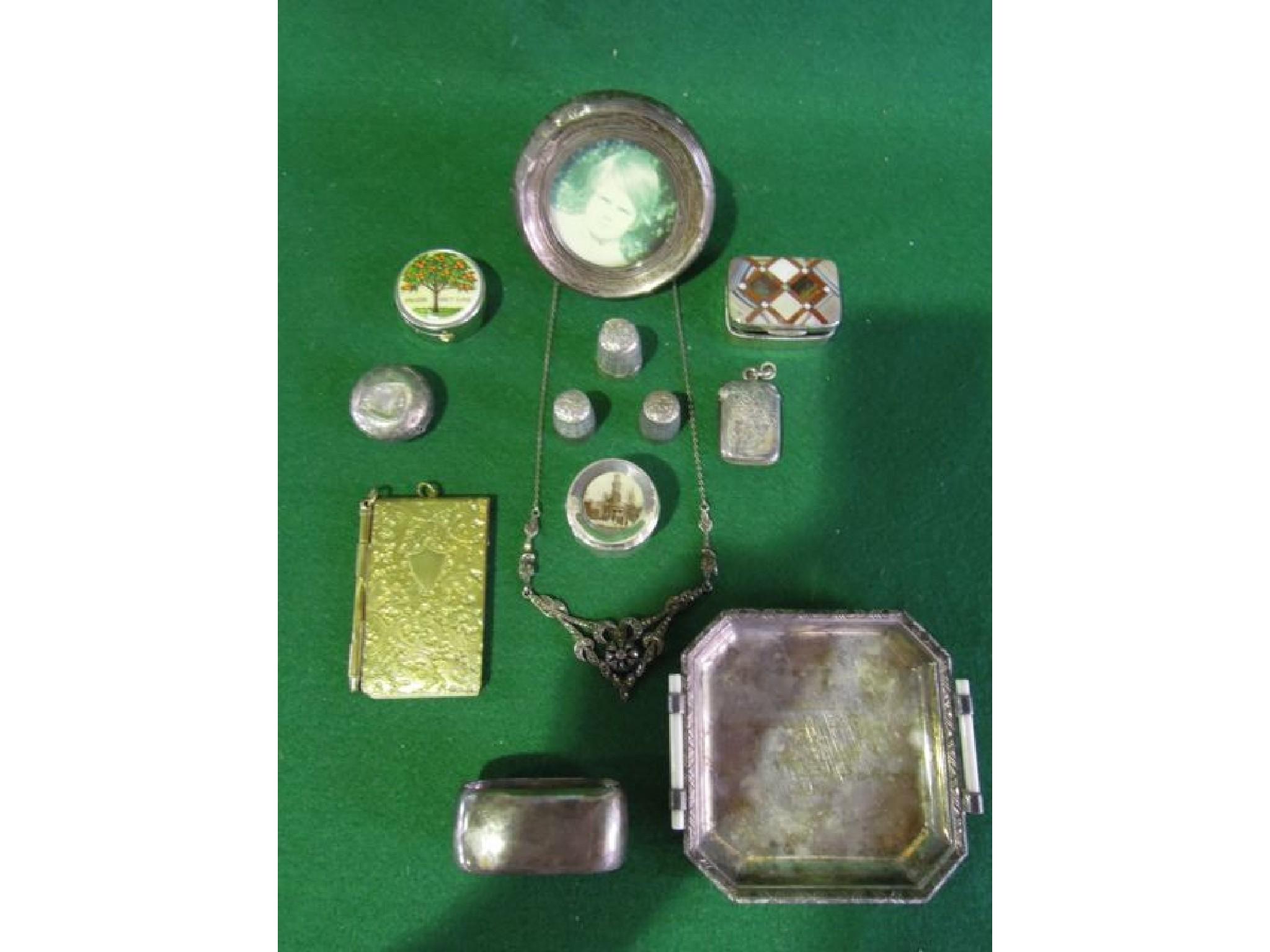 Appraisal: An interesting collection of items including a silver vesta case