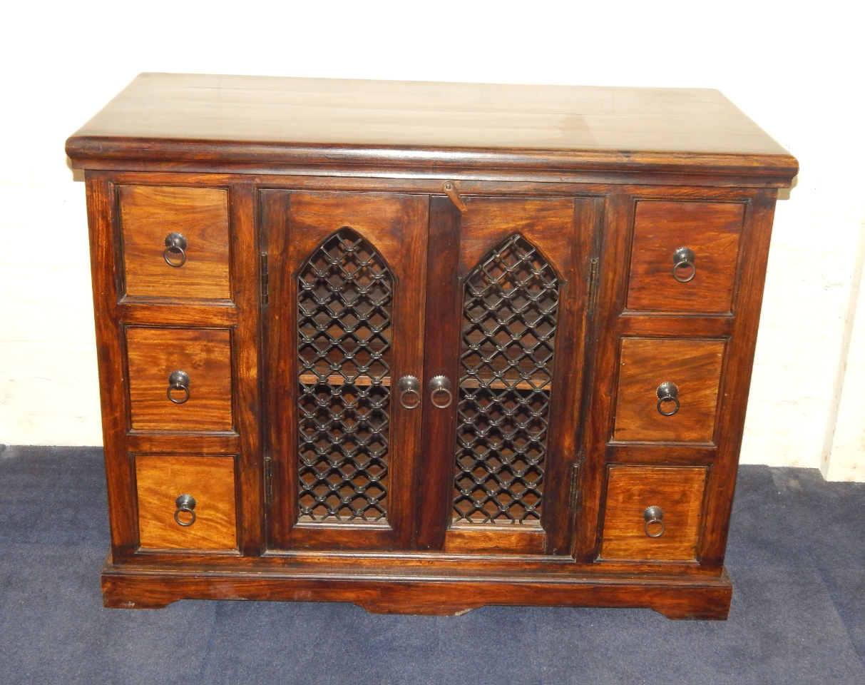 Appraisal: An Eastern hardwood cupboard with a pair of metal lattice